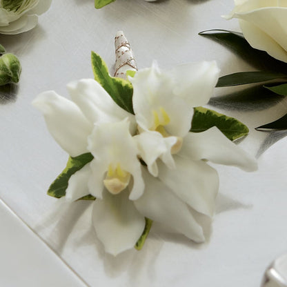 White Mini Cymbidium Boutonniere – SYLVIA'S FLORIST, Antioch CA